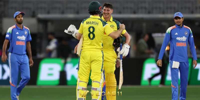 Australia captain Mitchell Marsh and debutant Matt Renshaw celebrating ODI victory against India at Perth Stadium rain-affected match October 2025