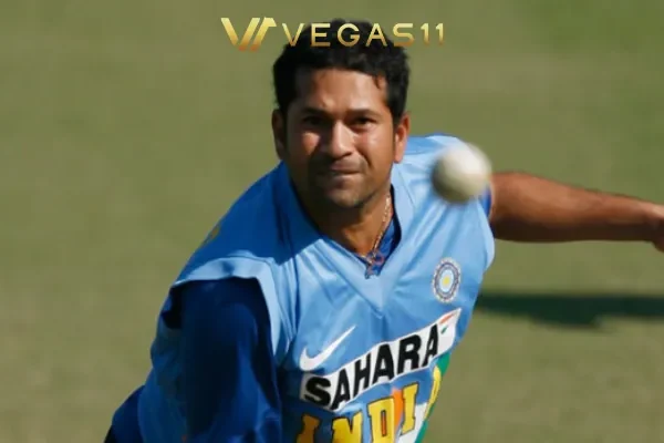 Jasprit Bumrah bowling in ODI cricket, approaching Sachin Tendulkar's wicket tally