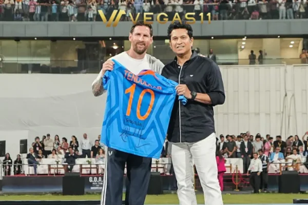 Sachin Tendulkar and Lionel Messi exchanging jerseys at Wankhede Stadium Mumbai GOAT Tour 2025