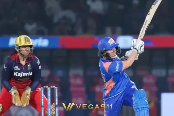 Nat Sciver-Brunt celebrates her match-winning century for Mumbai Indians against Royal Challengers Bangalore