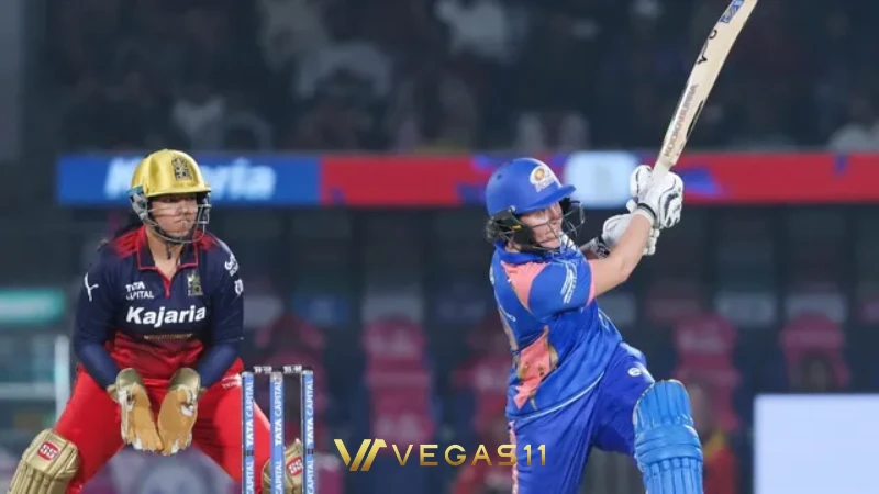 Nat Sciver-Brunt celebrates her match-winning century for Mumbai Indians against Royal Challengers Bangalore