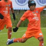 Minerva Academy FC players celebrate winning the Helsinki Cup 2026 title in Finland
