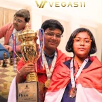 Mayank Chakraborty and Pratitee Bordoloi pose with gold medals at Asian Junior Chess Championship in Mumbai