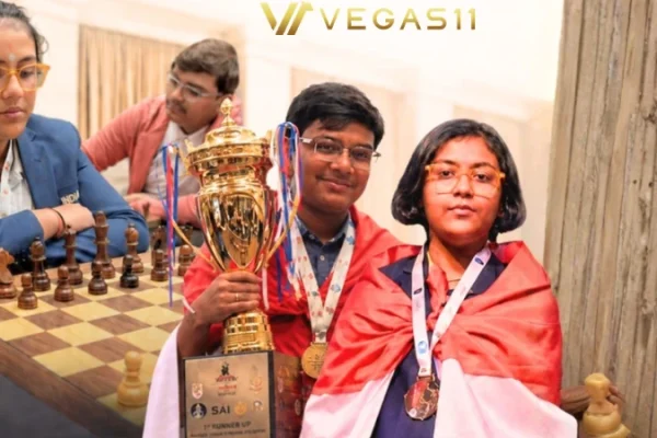 Mayank Chakraborty and Pratitee Bordoloi pose with gold medals at Asian Junior Chess Championship in Mumbai