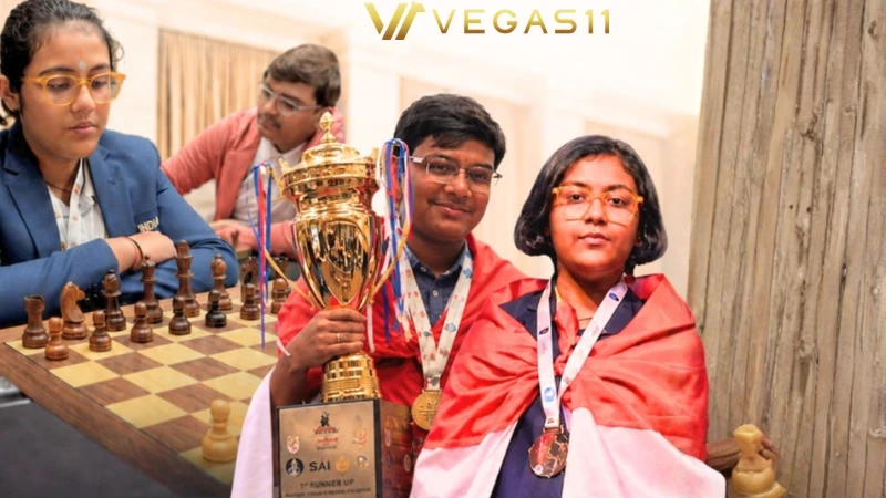 Mayank Chakraborty and Pratitee Bordoloi pose with gold medals at Asian Junior Chess Championship in Mumbai
