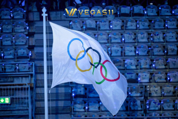 Qatari officials hold the Olympic Council of Asia flag at the Asian Games closing ceremony in Nagoya as Qatar eyes the 2036 Olympics