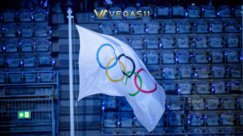 Qatari officials hold the Olympic Council of Asia flag at the Asian Games closing ceremony in Nagoya as Qatar eyes the 2036 Olympics